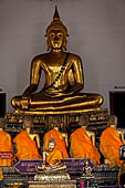 Bangkok Wat Pho, the southern wihan, one of the four side chapels around the ubosot. Buddha statue called Buddha Chinnaraja with five disciples seated in front.  